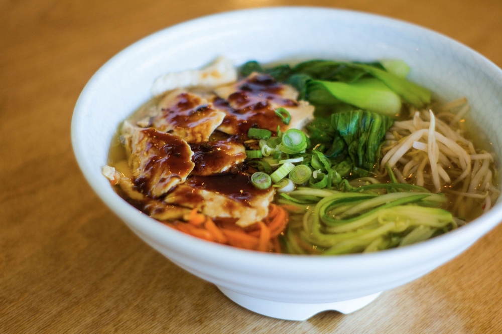Hello Dumpling signature dishes Braised Beef Soup Noodle, Grilled Chicken Noodle Soup, Chicken Rice Dumplings.